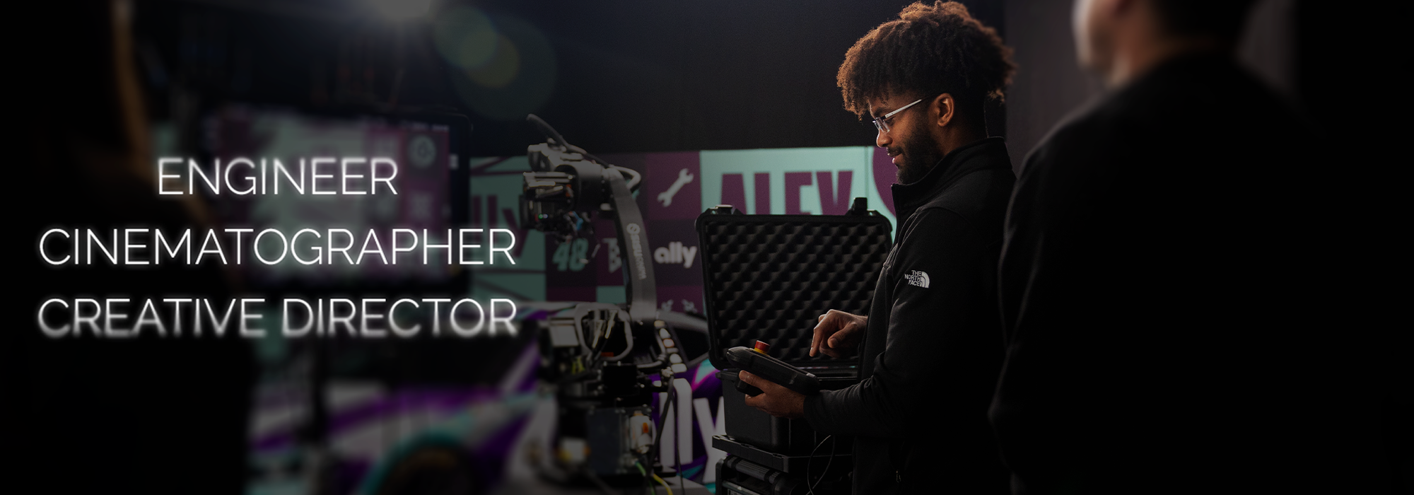 Emmanuel Wallace operating a motion-control cinema robot on set — Engineer, Cinematographer, Creative Director